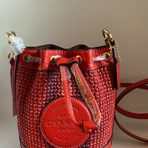Mini Dempsey Bucket Bag w/Coach Patch 5.5” L x 6.5” H x 3.5” W Vibrant Red NWT